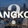 バンコクの煌びやかな高層ビル群の夜景の上に、大きく「BANGKOK?」という文字と疑問符が重なっている画像
